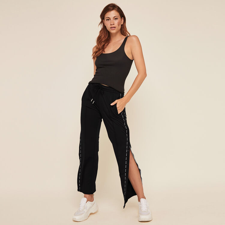 Pantalon jogging ouverture sur les côtés Pantalon jogging ouverture sur les côtés;