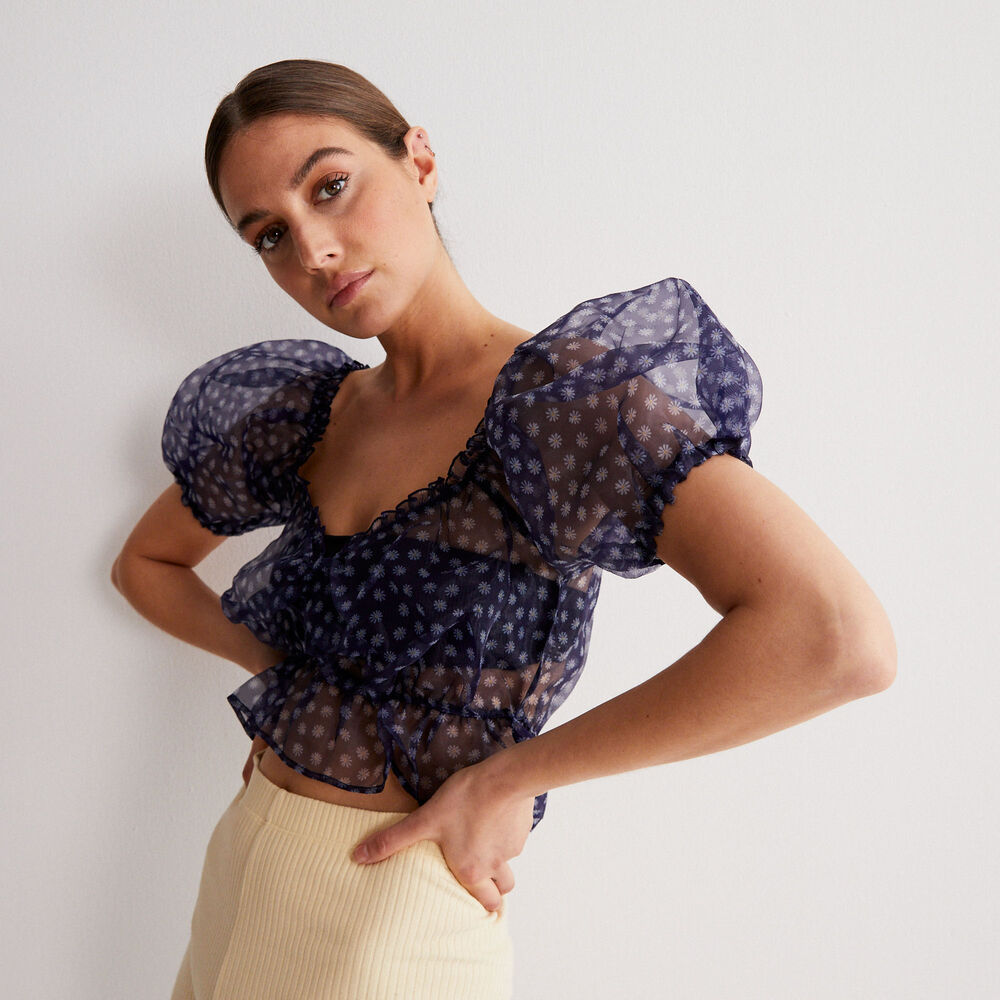 Top à manche bouffante motifs paquerettes - noir noir.